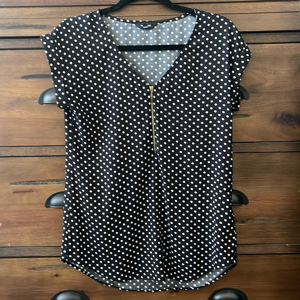 Size small, women’s Express black and white polkadot top with zipper.